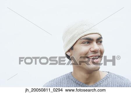 Young man wearing a hat View Large Photo Image Picture - Young man wearing a hat. Fotosearch
