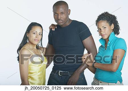 Young man with two girlfriends View Large Photo Image Stock Photography - Young man with two girlfriends. Fotosearch