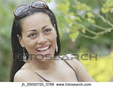 Young woman laughing View Large Photo Image Stock Photograph - Young woman laughing. Fotosearch