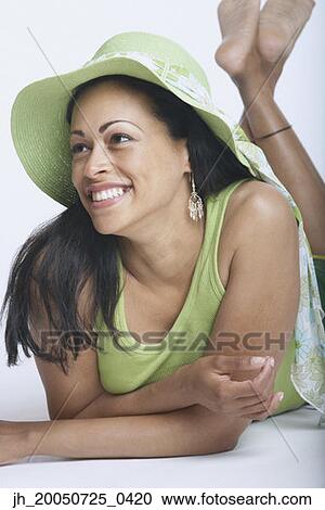 Young woman posing for the camera View Large Photo Image Stock Image - Young woman posing for the camera. Fotosearch