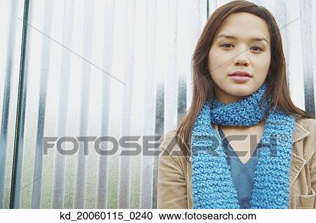 Young woman posing for the camera View Large Photo Image Stock Image - Young woman posing for the camera. Fotosearch
