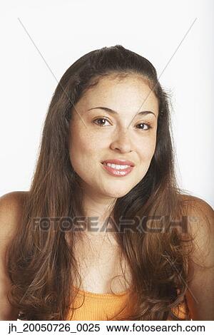 Young woman posing for the camera View Large Photo Image Stock Photography - Young woman posing for the camera. Fotosearch