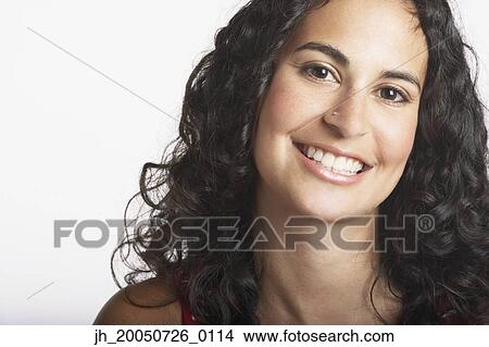 Young woman smiling for the camera View Large Photo Image Picture - Young woman smiling for the camera. Fotosearch
