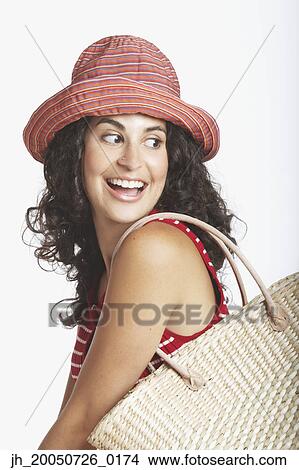 Young woman smiling for the camera View Large Photo Image Picture - Young woman smiling for the camera. Fotosearch
