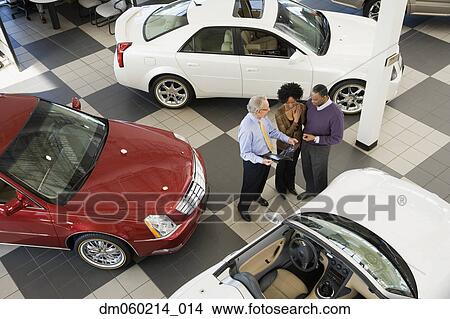 Picture - Couple buying a car. Fotosearch