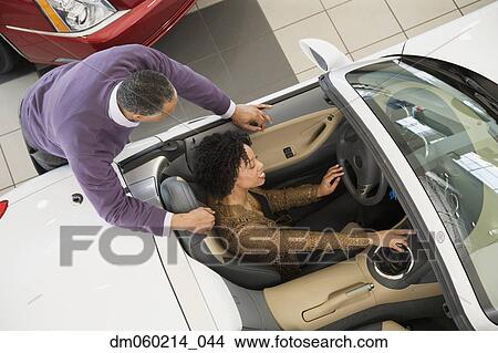Picture - Couple buying a car. Fotosearch