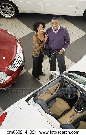 Stock Image - Couple buying a car. Fotosearch