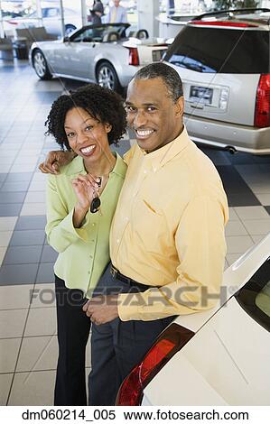 Stock Photography - Couple buying a car. Fotosearch