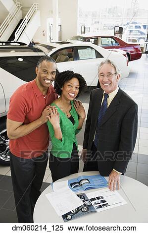 Stock Photography - Couple buying a car. Fotosearch