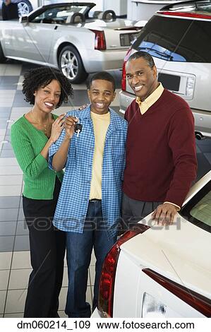 Stock Photo - Family buying a car. Fotosearch