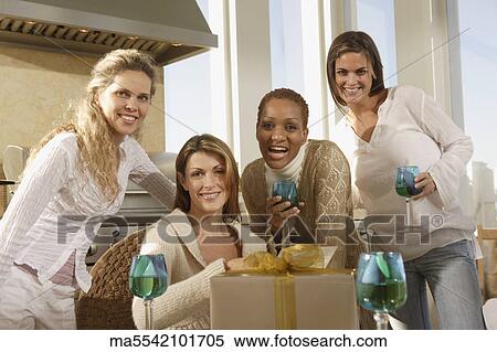 Friends drinking wine together View Large Photo Image Stock Photography - Friends drinking wine together. Fotosearch