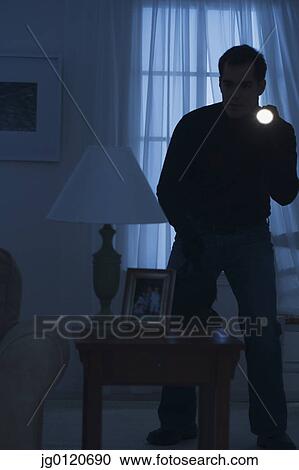 Thief creeping around a room View Large Photo Image Stock Image - Thief creeping around a room. Fotosearch