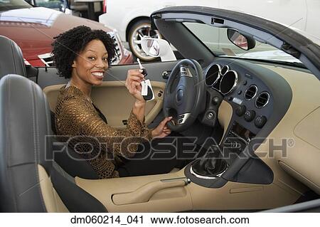 Woman buying a car View Large Photo Image Stock Image - Woman buying a car. Fotosearch
