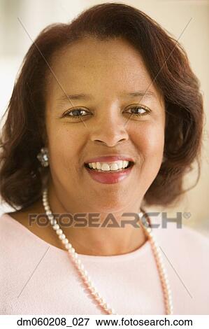 Woman smiling View Large Photo Image Stock Photo - Woman smiling. Fotosearch