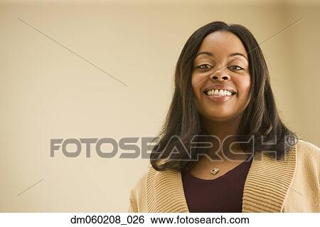 Woman smiling View Large Photo Image Stock Photograph - Woman smiling. Fotosearch