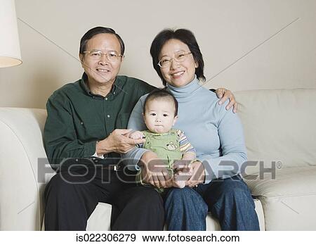 Asian family with baby View Large Photo Image Stock Photo - Asian family with baby. Fotosearch