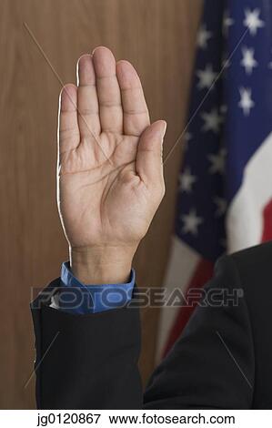 Close up of male hand raised with palm forward View Large Photo Image Stock Photo - Close up of male hand raised with palm forward. Fotosearch