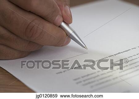 Close up of man signing document View Large Photo Image Stock Photo - Close up of man signing document. Fotosearch