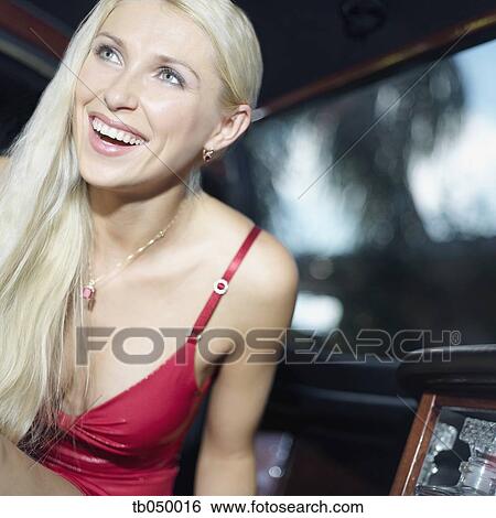 Close up of woman in sexy dress in limousine View Large Photo Image Stock Photograph - Close up of woman in sexy dress in limousine. Fotosearch