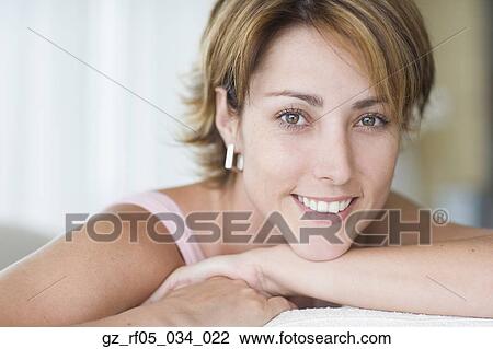 Close up of woman smiling View Large Photo Image Stock Image - Close up of woman smiling. Fotosearch