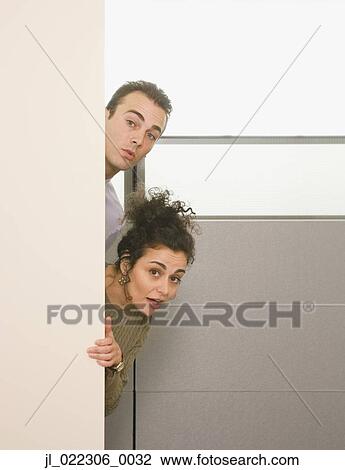 Stock Photo of Co-workers peeking around corner jl_022306_0032 - Search ...