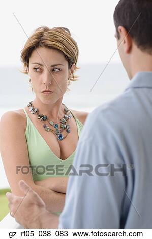 Stock Image - Couple talking. Fotosearch
