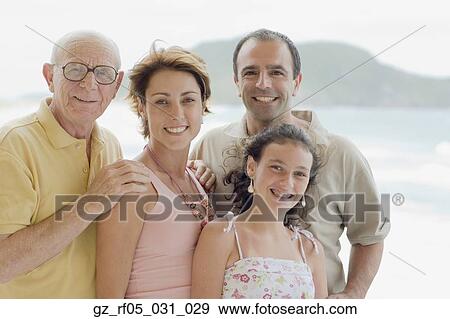 Family smiling outdoors, Florianopolis, Brazil View Large Photo Image Stock Photo - Family smiling outdoors, Florianopolis, Brazil. Fotosearch
