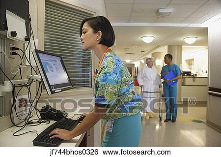 Female nurse using computer, Bethesda, Maryland, United States View Large Photo Image Stock Photograph - Female nurse using computer, Bethesda, Maryland, United States. Fotosearch