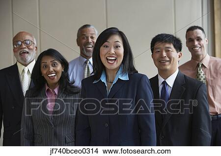 Group of co-workers laughing View Large Photo Image Picture - Group of co-workers laughing. Fotosearch