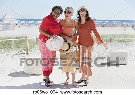 Group of middle-aged women at the beach, Miami, Florida, United States View Large Photo Image Picture - Group of middle-aged women at the beach, Miami, Florida, United States. Fotosearch