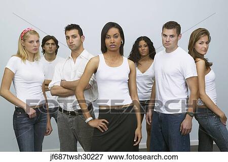 Stock Photo - Group of young people looking serious. Fotosearch