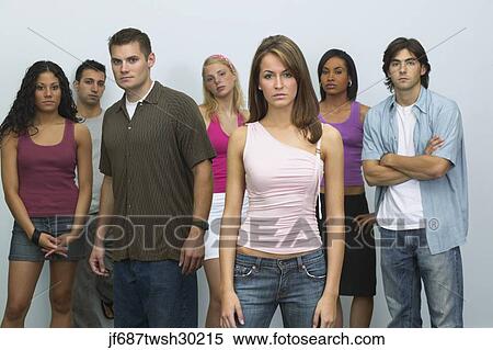 Group of young people looking serious View Large Photo Image Stock Photography - Group of young people looking serious. Fotosearch