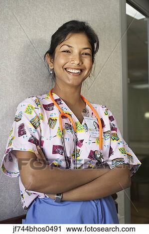 Indian female nurse smiling View Large Photo Image Stock Image - Indian female nurse smiling. Fotosearch