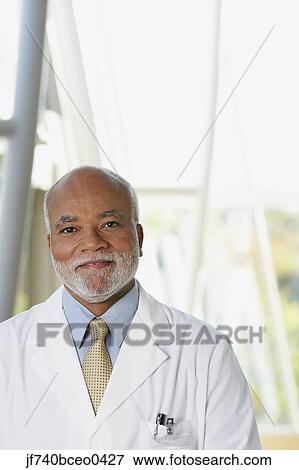 Senior male African doctor smiling, North Bethesda, Maryland, United States View Large Photo Image Stock Photo - Senior male African doctor smiling, North Bethesda, Maryland, United States. Fotosearch