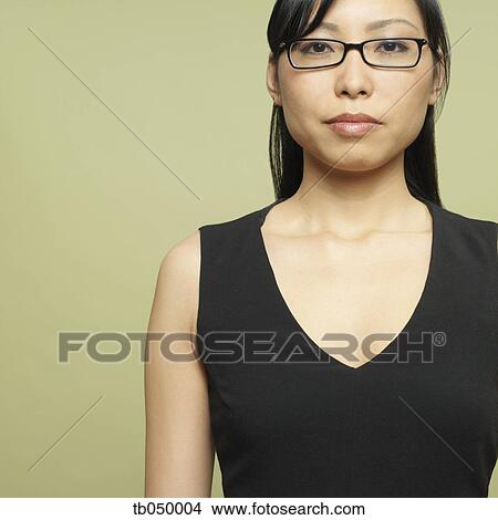 Picture - Studio shot of Asian woman. Fotosearch