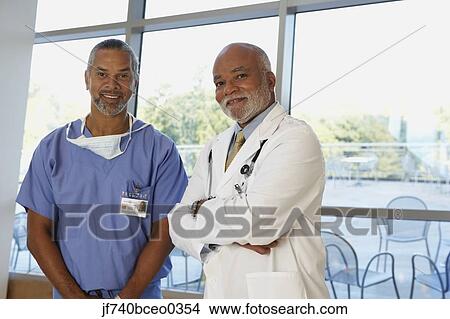 Two middle-aged African doctors, North Bethesda, Maryland, United States View Large Photo Image Picture - Two middle-aged African doctors, North Bethesda, Maryland, United States. Fotosearch