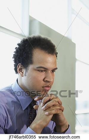 African American businessman with hands folded View Large Photo Image Stock Photography - African American businessman with hands folded. Fotosearch