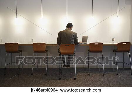 African American businessman with laptop View Large Photo Image Picture - African American businessman with laptop. Fotosearch