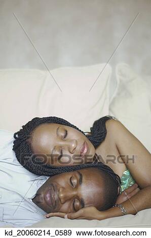 African American couple sleeping on sofa View Large Photo Image Stock Photo - African American couple sleeping on sofa . Fotosearch