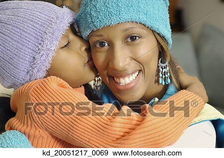 African American girl kissing mother View Large Photo Image Stock Photo - African American girl kissing mother. Fotosearch