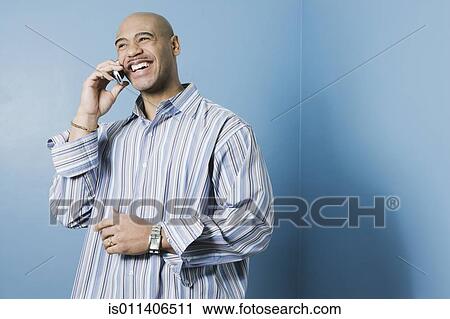 African American man talking on cell phone View Large Photo Image Stock Image - African American man talking on cell phone. Fotosearch