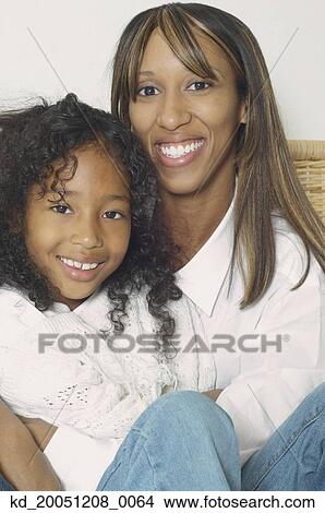 African American mother and daughter smiling View Large Photo Image Picture - African American mother and daughter smiling. Fotosearch