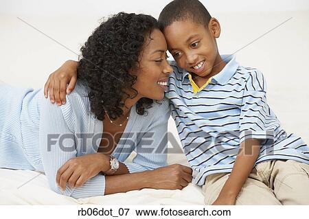 Stock Photo - African American woman and young son. Fotosearch