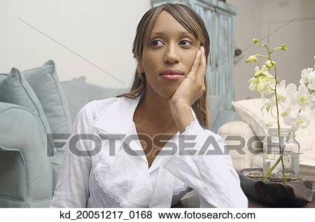 African American woman leaning on elbow View Large Photo Image Stock Photo - African American woman leaning on elbow. Fotosearch