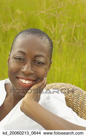 African American woman smiling outdoors View Large Photo Image Picture - African American woman smiling outdoors. Fotosearch