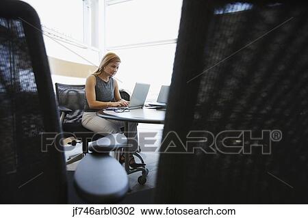 Businesswoman with laptop View Large Photo Image Stock Image - Businesswoman with laptop. Fotosearch