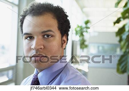 Picture - Close up of African American businessman. Fotosearch