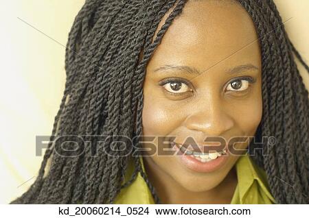 Picture - Close up of African American woman smiling. Fotosearch
