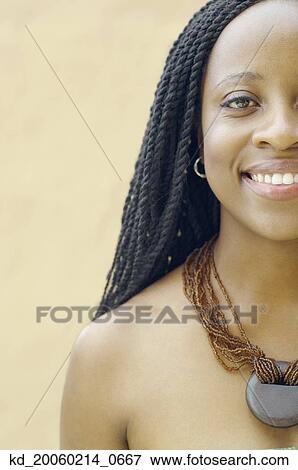 Close up of African American woman smiling View Large Photo Image Stock Photo - Close up of African American woman smiling. Fotosearch