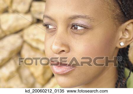 Stock Photography - Close up of African American woman. Fotosearch